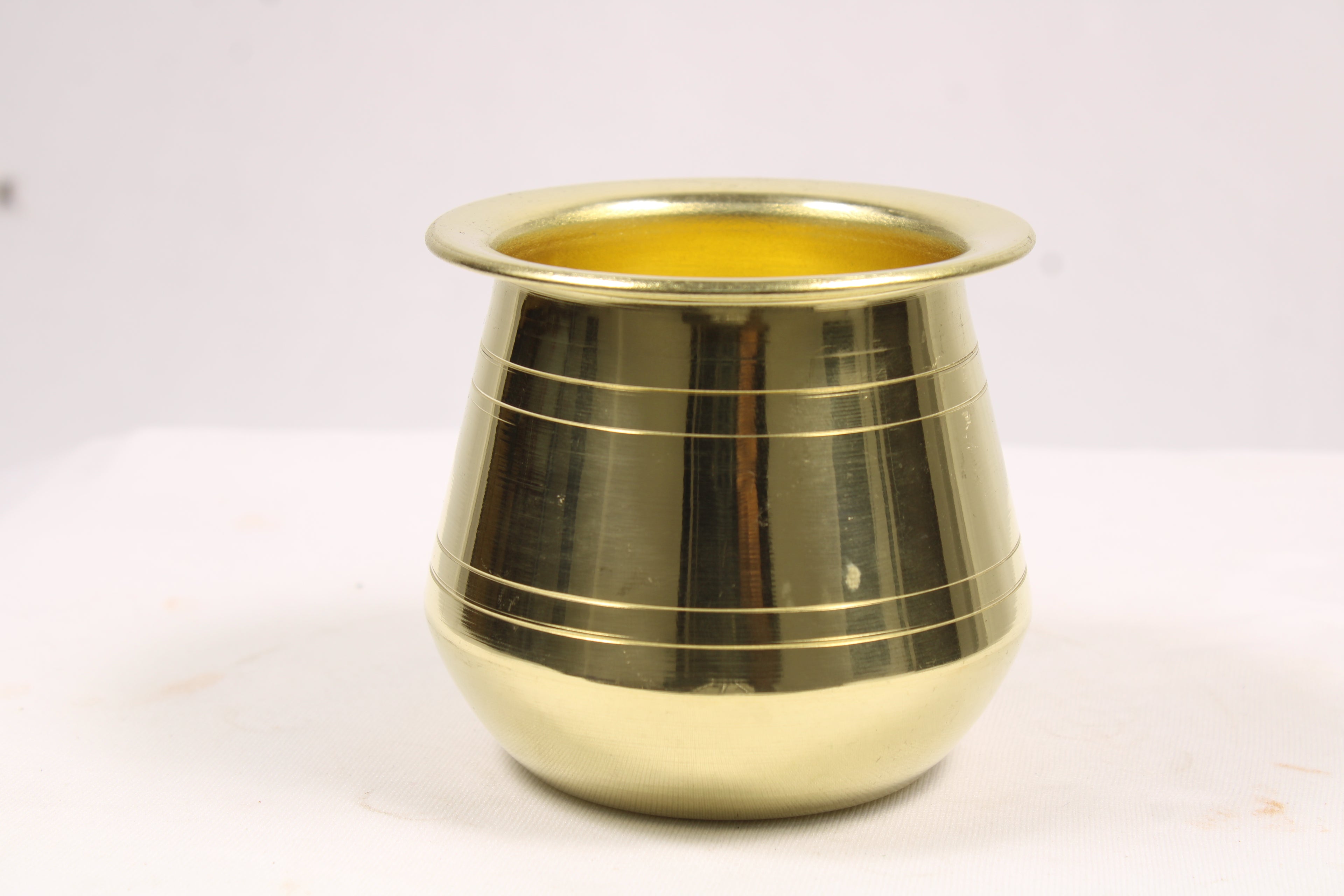 A sacred addition to your puja thali, this Pure Brass Panch Patra (Brass Glass) is ideal for holding water, milk, or other offerings during daily puja and temple rituals. Perfect for abhishekam, jal arpan, and festive ceremonies.