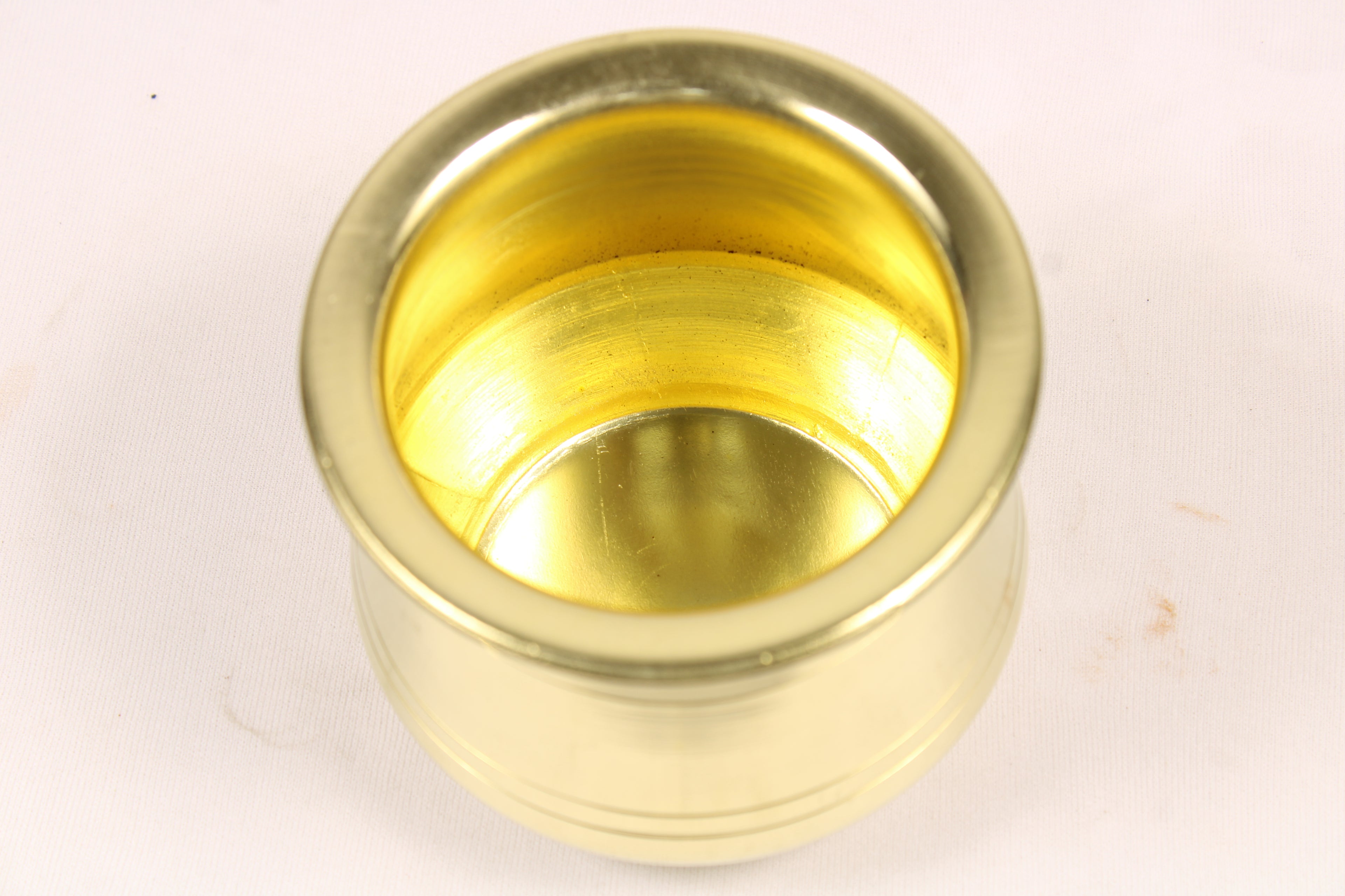 A sacred addition to your puja thali, this Pure Brass Panch Patra (Brass Glass) is ideal for holding water, milk, or other offerings during daily puja and temple rituals. Perfect for abhishekam, jal arpan, and festive ceremonies.