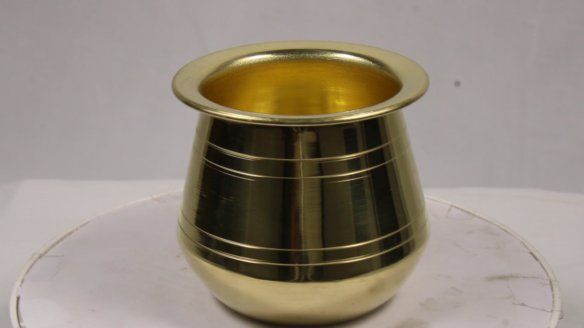 A sacred addition to your puja thali, this Pure Brass Panch Patra (Brass Glass) is ideal for holding water, milk, or other offerings during daily puja and temple rituals. Perfect for abhishekam, jal arpan, and festive ceremonies.